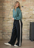 Pantalones deportivos Nina de pernera ancha