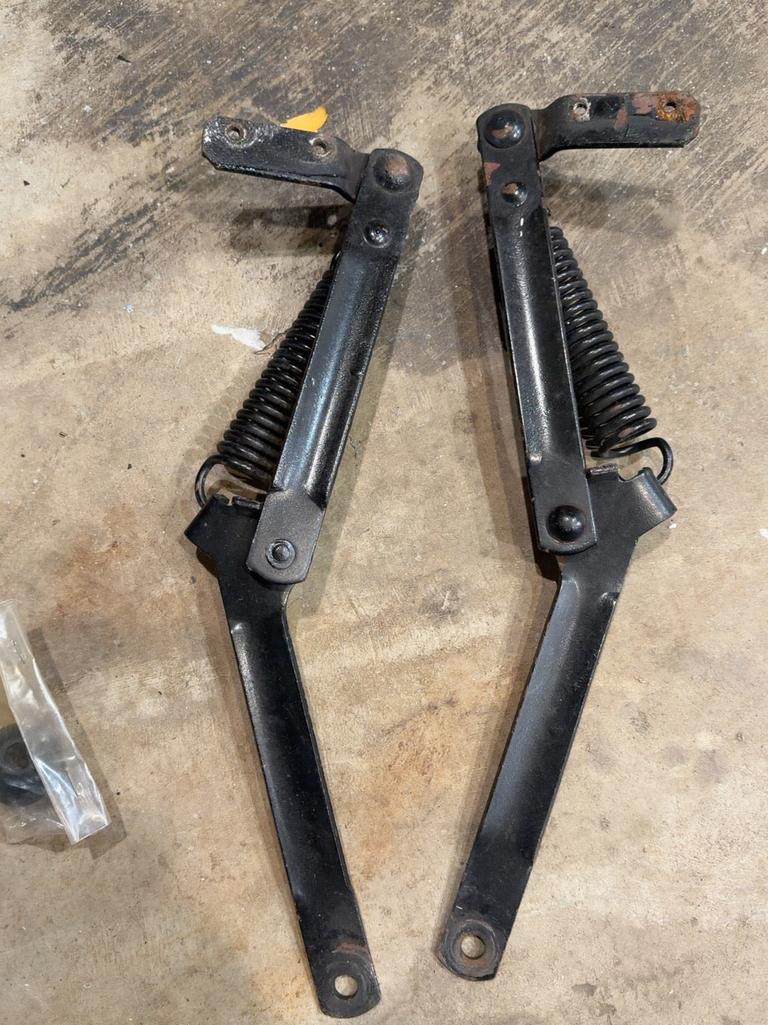Pair of Vintique hood support arms and springs