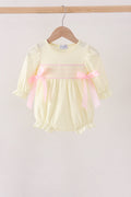 Cream smocked bow bubble