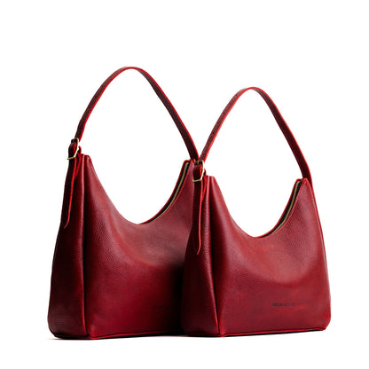 https://cdn.shopify.com/s/files/1/0712/1227/files/aspen-shoulder-bag-chili-red-comparison-wo-PLG.jpg?v=1767121370