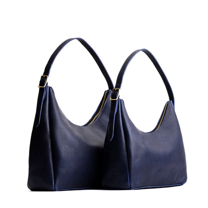 https://cdn.shopify.com/s/files/1/0712/1227/files/aspen-shoulder-bag-cobalt-comparison-wo-PLG.jpg?v=1770064579