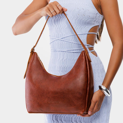https://cdn.shopify.com/s/files/1/0712/1227/files/aspen-shoulder-bag-medium-nutmeg-304-Edit.jpg?v=1770413200