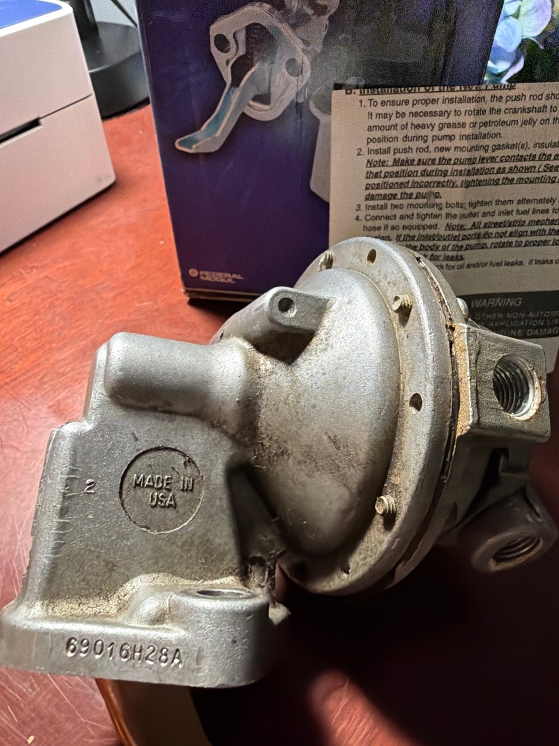 Close-up of Carter fuel pump body and 6901GH28A marking