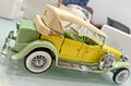Original photo of the yellow and green Franklin Mint 1930 Duesenberg J Derham Tourster