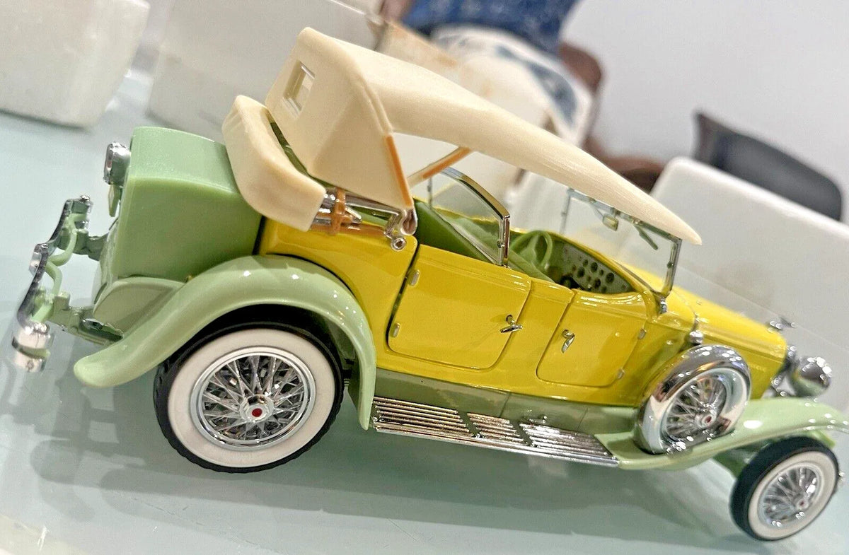 Original photo of the yellow and green Franklin Mint 1930 Duesenberg J Derham Tourster