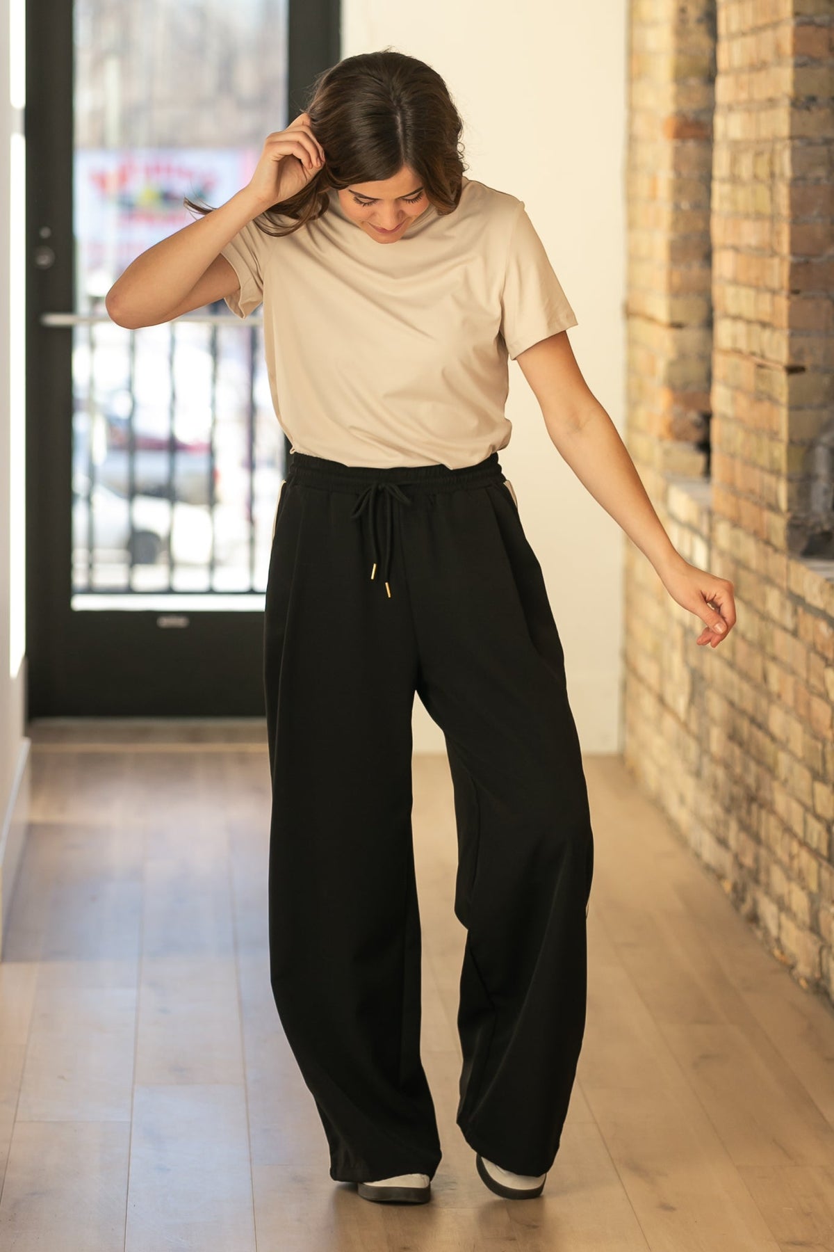 Pantalones deportivos Nina de pernera ancha