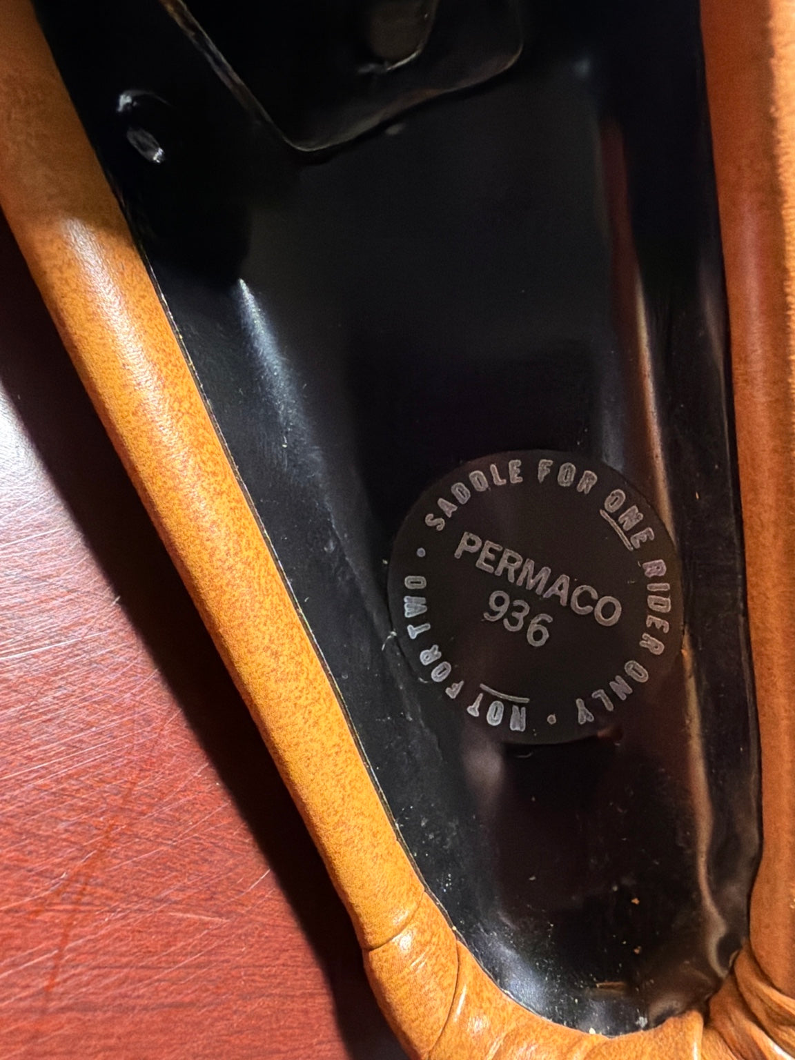 Underside marking on Schwinn saddle reading Permaco 936